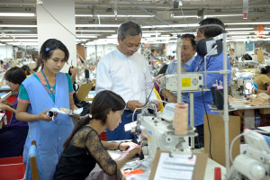 MGMA chairman U Myint Soe with the facotry management team from Anita Asia